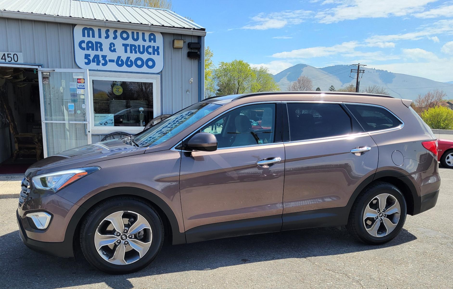 2015 Brown /Tan Hyundai Santa Fe GLS (KM8SMDHF7FU) with an 3.3L V6 engine, 6 Speed Auto transmission, located at 450 N Russell, Missoula, MT, 59801, (406) 543-6600, 46.874496, -114.017433 - Photo #0
